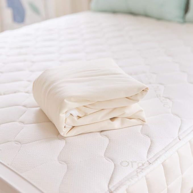 Naturepedic Organic Waterproof Mattress Protector Pad - Washable & Reusable Fitted Stretch Knit Mattress Cover - Highly Absorbent Bed Incontinence Pads - Breathable Fitted Cover for Twin 9"-16"